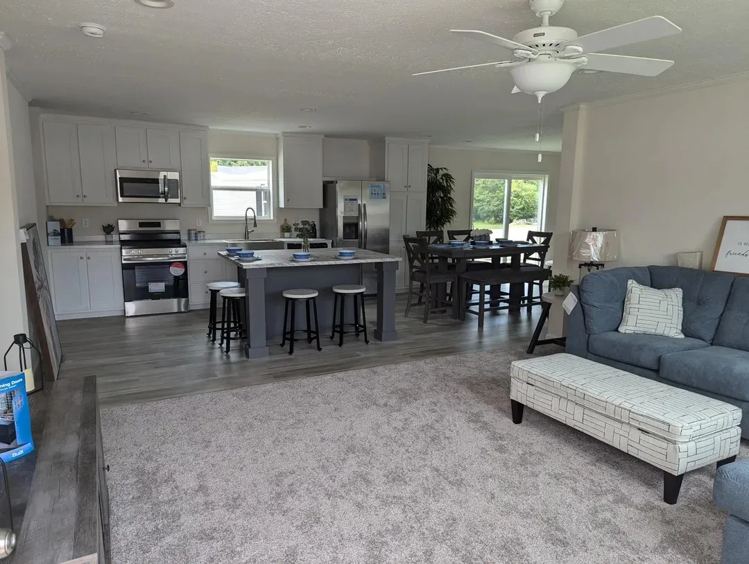 The MOONSTONE Living Room. This Manufactured Mobile Home features 3 bedrooms and 2 baths.