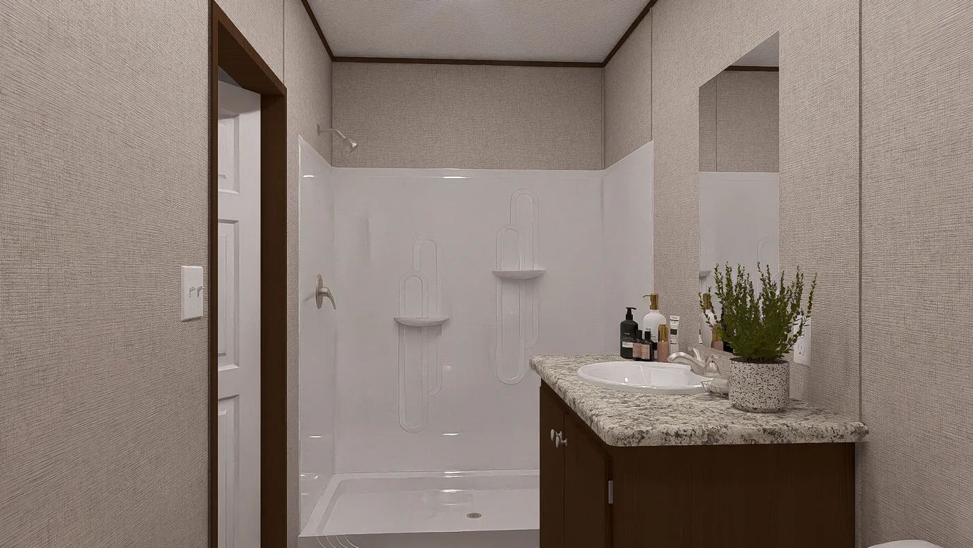 The BIRCH Primary Bathroom. This Manufactured Mobile Home features 3 bedrooms and 2 baths.
