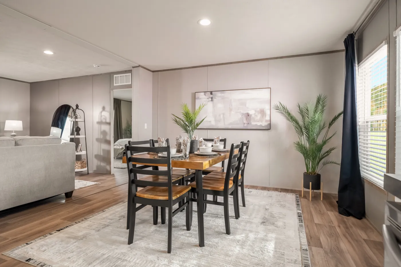 The ECLIPSE Dining Area. This Manufactured Mobile Home features 4 bedrooms and 2 baths.