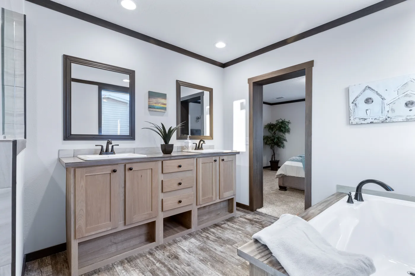 The BOUJEE XL Primary Bathroom. This Manufactured Mobile Home features 4 bedrooms and 3 baths.
