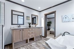 The BOUJEE XL Primary Bathroom. This Manufactured Mobile Home features 4 bedrooms and 3 baths.