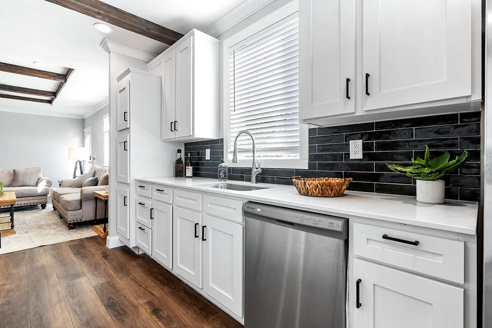 The THE VAIL Kitchen. This Manufactured Mobile Home features 3 bedrooms and 2 baths.