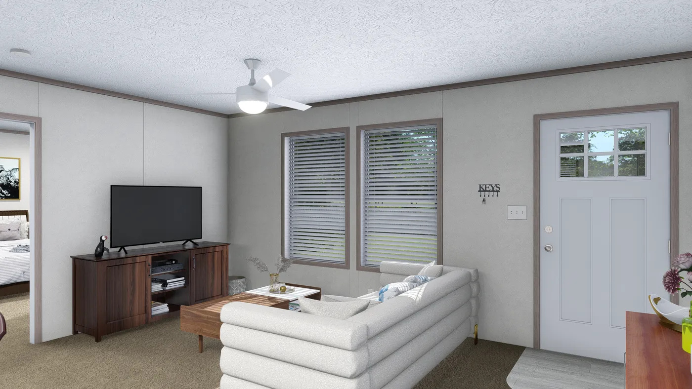 The 5624-E744 THE PULSE Living Room. This Manufactured Mobile Home features 3 bedrooms and 2 baths.