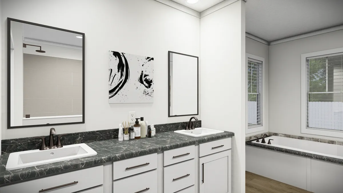 The THE PARKER Primary Bathroom. This Manufactured Mobile Home features 3 bedrooms and 2 baths.