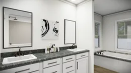 The THE PARKER Primary Bathroom. This Manufactured Mobile Home features 3 bedrooms and 2 baths.