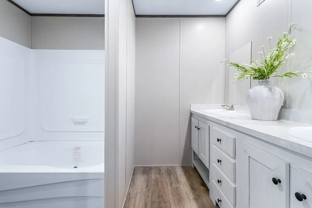 The SELECT 16723F Primary Bathroom. This Manufactured Mobile Home features 3 bedrooms and 2 baths.