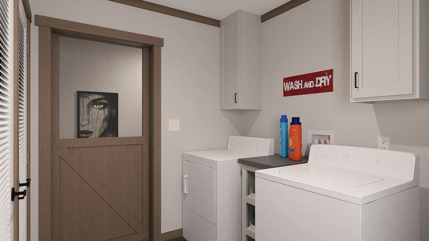 The EVERETT Utility Room. This Manufactured Mobile Home features 4 bedrooms and 3 baths.