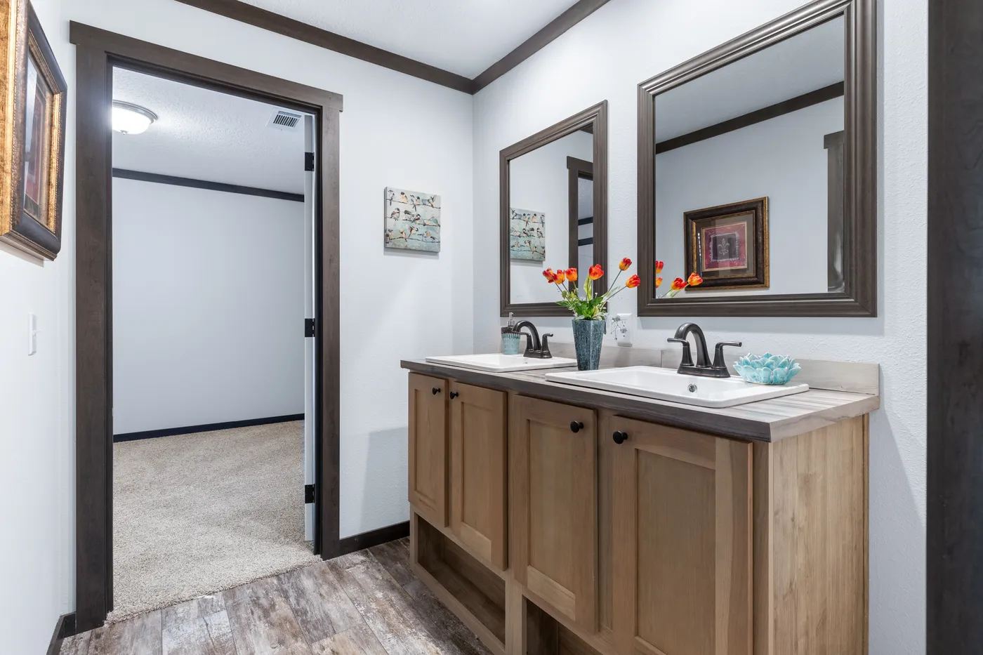 The BOUJEE XL Primary Bathroom. This Manufactured Mobile Home features 4 bedrooms and 3 baths.