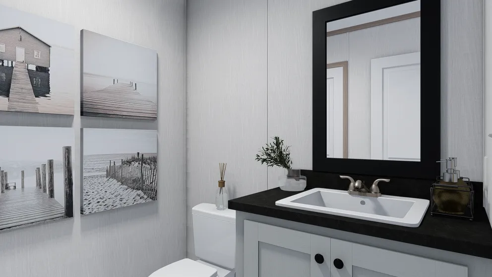 The 6428-E792 THE PULSE Guest Bathroom. This Manufactured Mobile Home features 3 bedrooms and 2.5 baths.