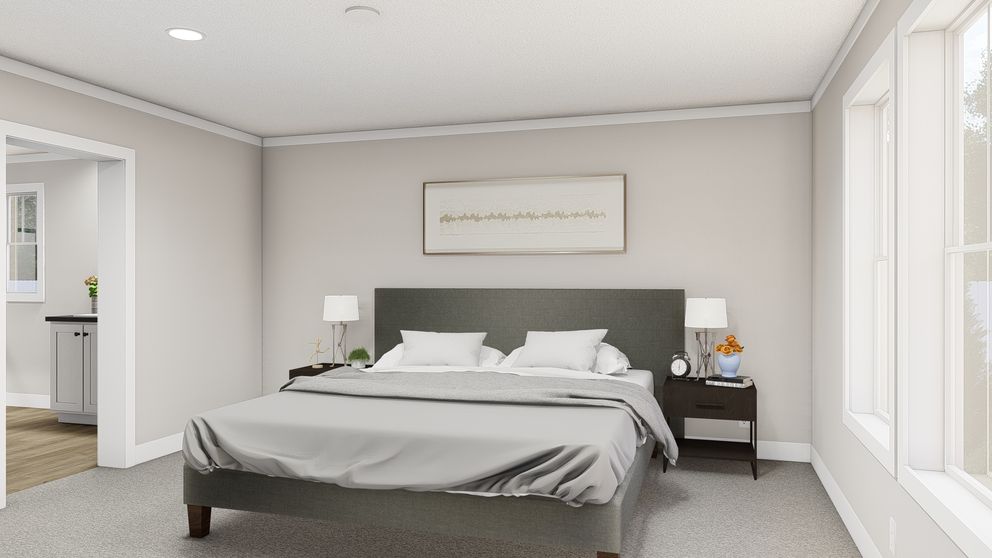 The LIMELIGHT Primary Bedroom. This Manufactured Mobile Home features 3 bedrooms and 2 baths.