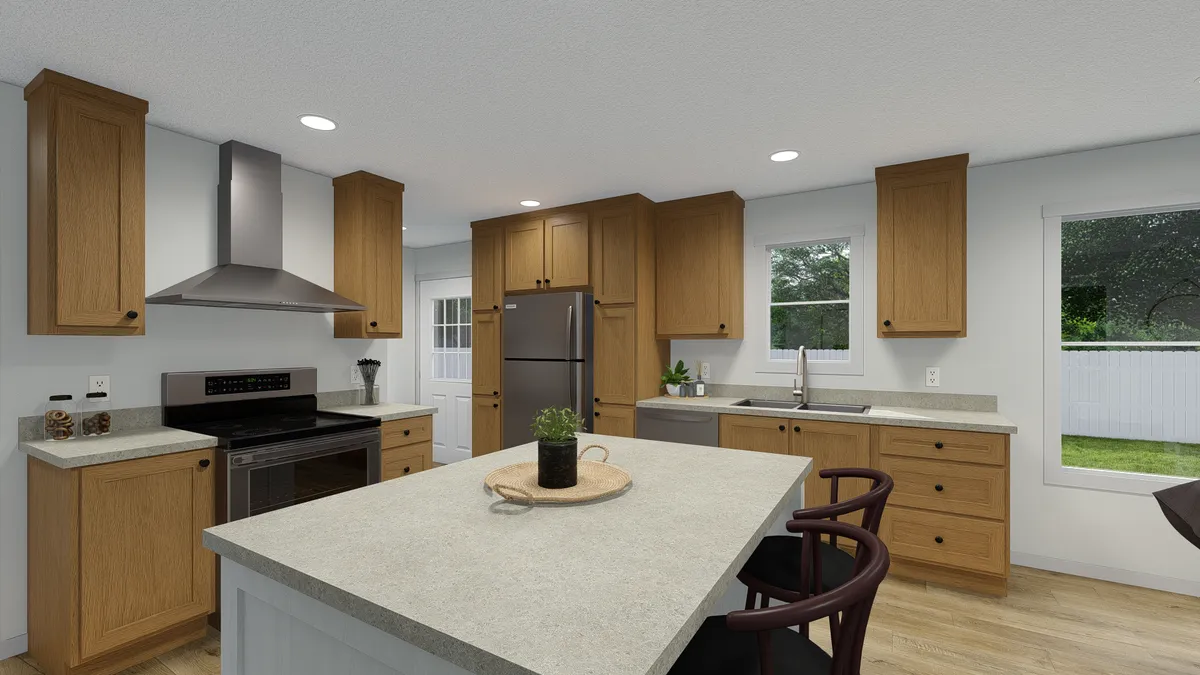 The MOVE ON UP Kitchen. This Manufactured Mobile Home features 3 bedrooms and 2 baths.
