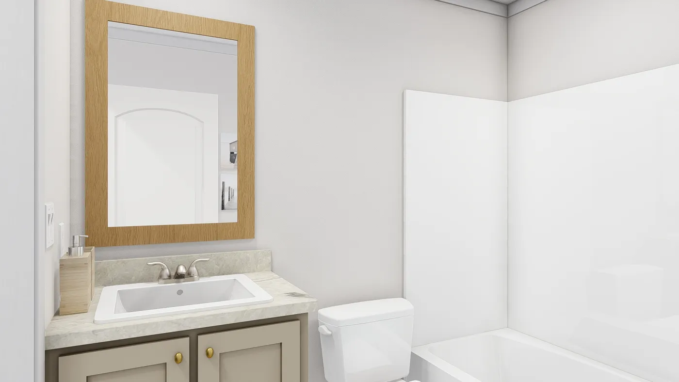 The STILL THE ONE Guest Bathroom. This Manufactured Mobile Home features 2 bedrooms and 2 baths.