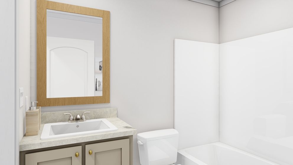 The STILL THE ONE Guest Bathroom. This Manufactured Mobile Home features 2 bedrooms and 2 baths.