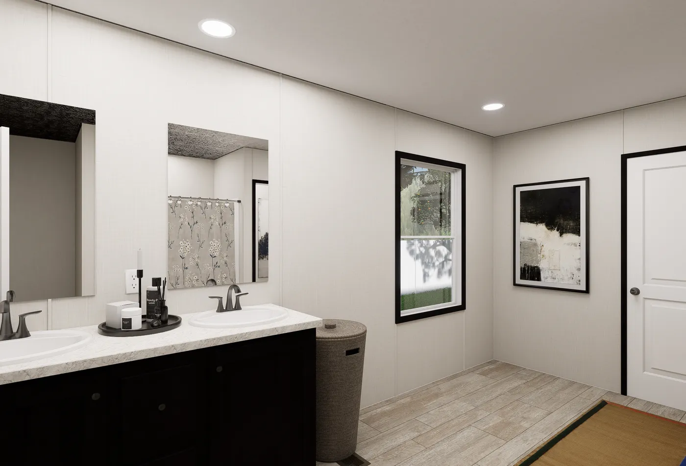 The ULTRA FLEX JEWEL GRANDE Primary Bathroom. This Manufactured Mobile Home features 4 bedrooms and 2 baths.