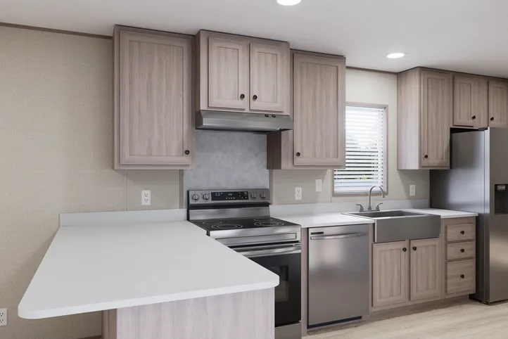 The THE ANNIVERSARY 76 Kitchen. This Manufactured Mobile Home features 3 bedrooms and 2 baths.