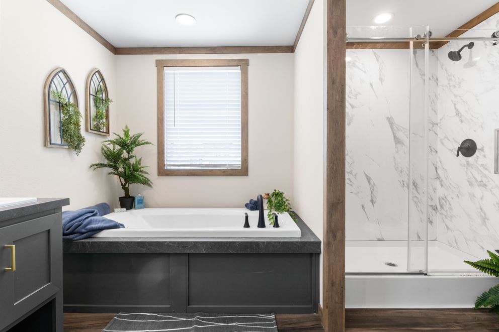 The FARM 4 FLEX Primary Bathroom. This Manufactured Mobile Home features 4 bedrooms and 3 baths.