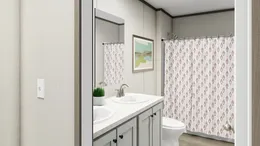 The LEGEND BIG BOY Guest Bathroom. This Manufactured Mobile Home features 4 bedrooms and 2 baths.