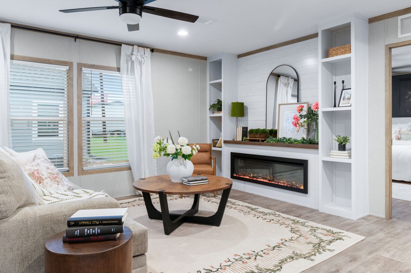 The EL SUENO BREEZE Living Room. This Manufactured Mobile Home features 4 bedrooms and 2 baths.