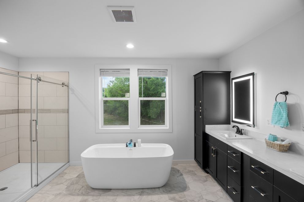 The LULABELLE 4 Primary Bathroom. This Manufactured Mobile Home features 4 bedrooms and 2.5 baths.