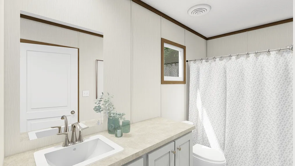 The THE INTUITION Primary Bathroom. This Manufactured Mobile Home features 3 bedrooms and 2 baths.