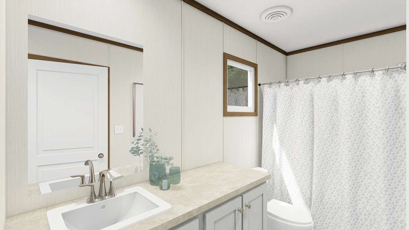 The THE INTUITION Primary Bathroom. This Manufactured Mobile Home features 3 bedrooms and 2 baths.