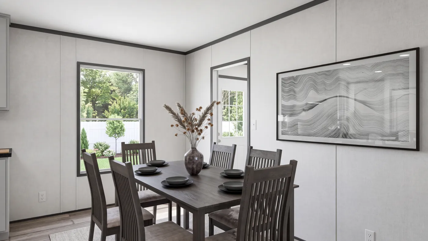 The THE MOUNTAINEER 56 Dining Area. This Manufactured Mobile Home features 3 bedrooms and 2 baths.