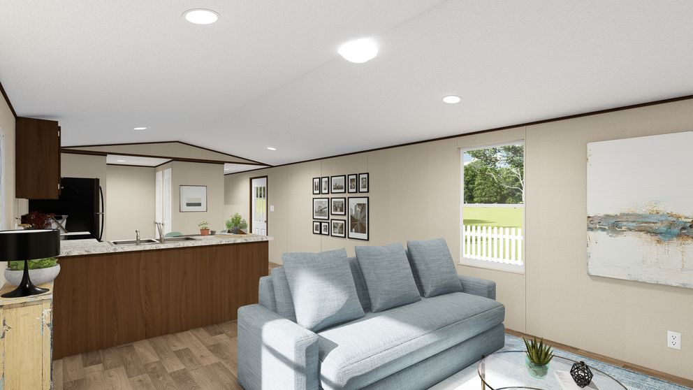 The BLISS Living Room. This Manufactured Mobile Home features 2 bedrooms and 1 bath.
