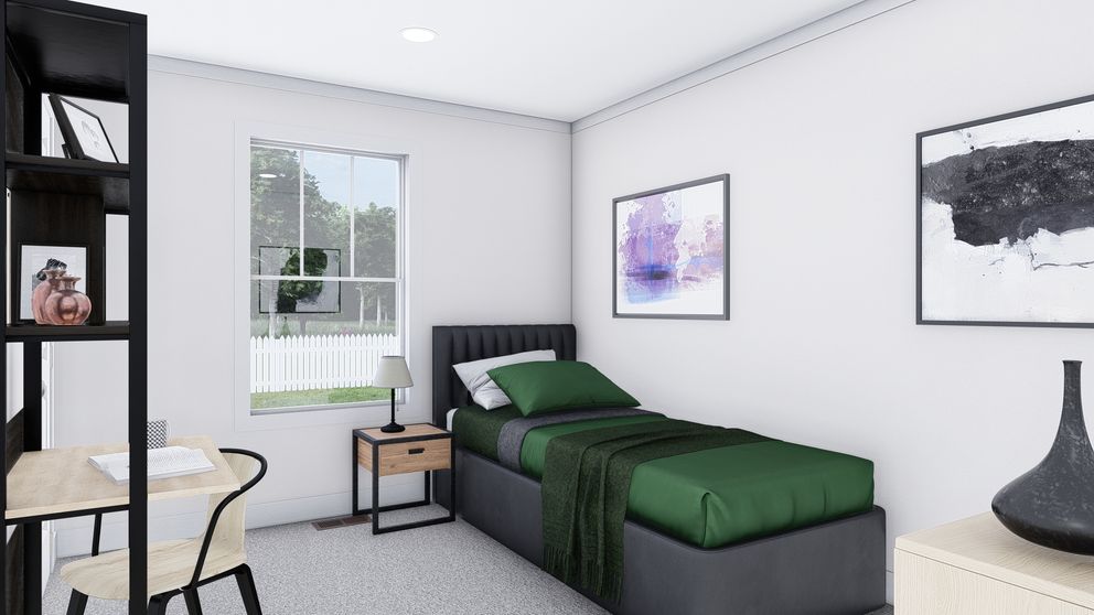 The STAYIN' ALIVE Guest Bedroom. This Manufactured Mobile Home features 3 bedrooms and 2 baths.