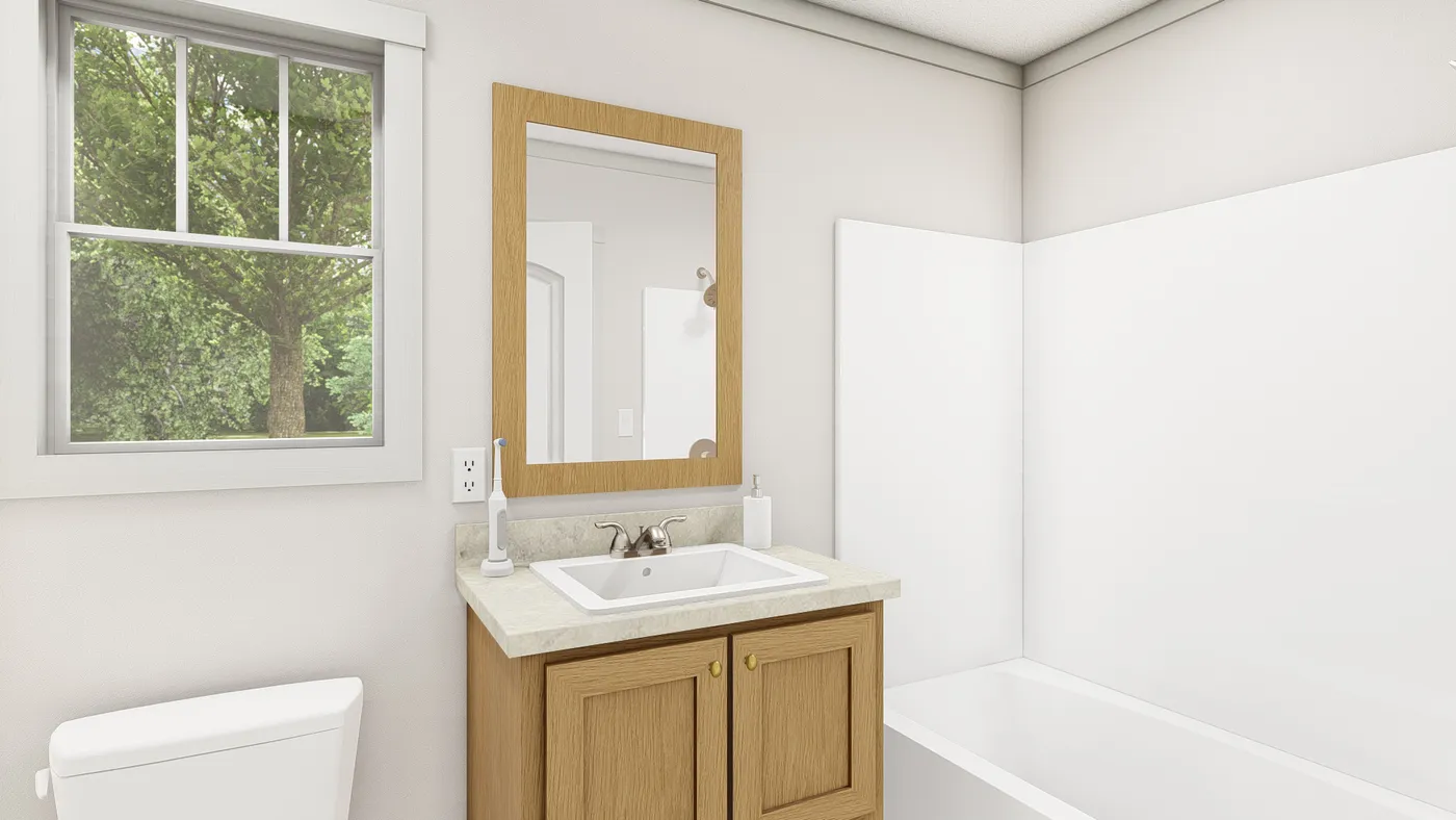 The 1007 "IMAGINE" 4014 Primary Bathroom. This Manufactured Mobile Home features 1 bedroom and 1 bath.