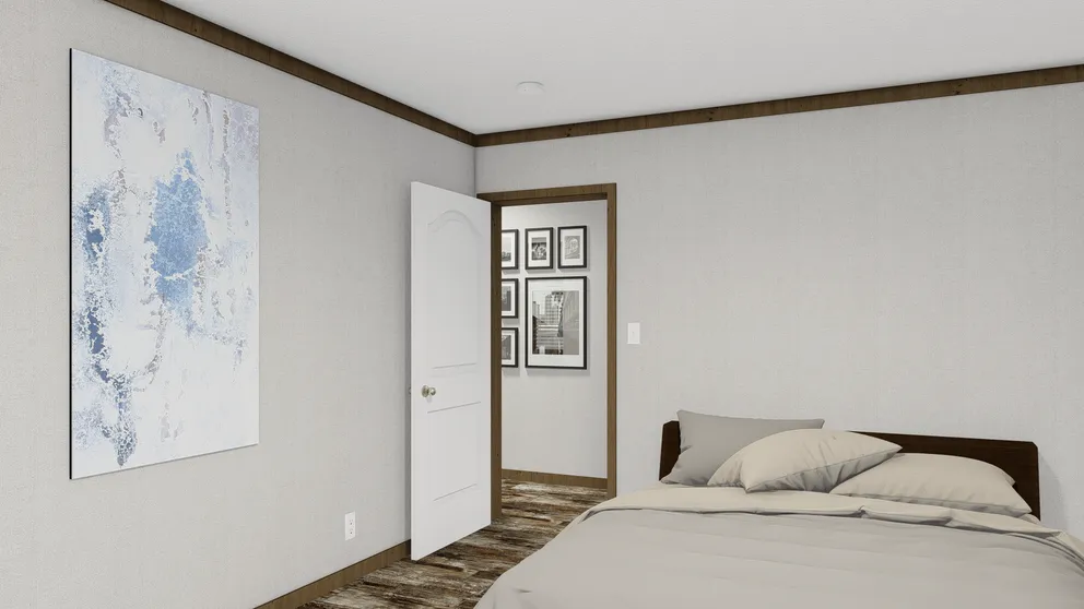 The HOMESTEAD BREEZE Bedroom. This Manufactured Mobile Home features 4 bedrooms and 2 baths.