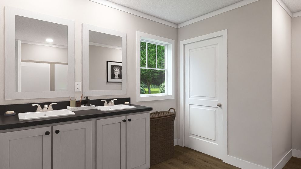 The WONDERFUL WORLD Primary Bathroom. This Modular Home features 3 bedrooms and 2 baths.