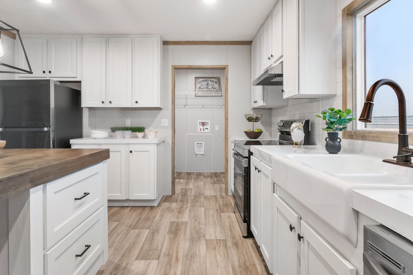 The THE CHOICE Kitchen. This Manufactured Mobile Home features 4 bedrooms and 2 baths.