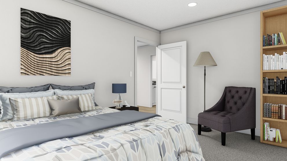 The ROCKET MAN Guest Bedroom. This Manufactured Mobile Home features 3 bedrooms and 2 baths.