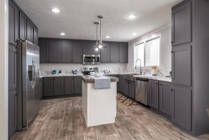 The THE FUSION 32B Kitchen. This Manufactured Mobile Home features 4 bedrooms and 2 baths.