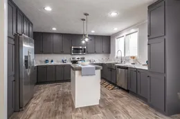 The THE FUSION 32B Kitchen. This Manufactured Mobile Home features 4 bedrooms and 2 baths.
