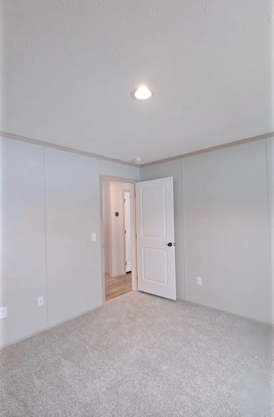 The TURQUOISE Guest Bedroom. This Manufactured Mobile Home features 2 bedrooms and 2 baths.