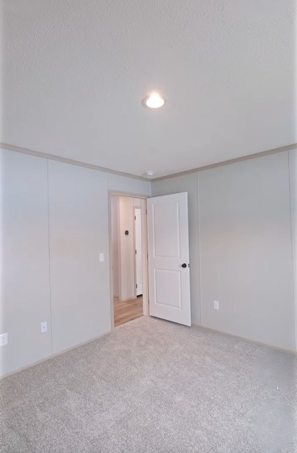 The TURQUOISE Guest Bedroom. This Manufactured Mobile Home features 2 bedrooms and 2 baths.