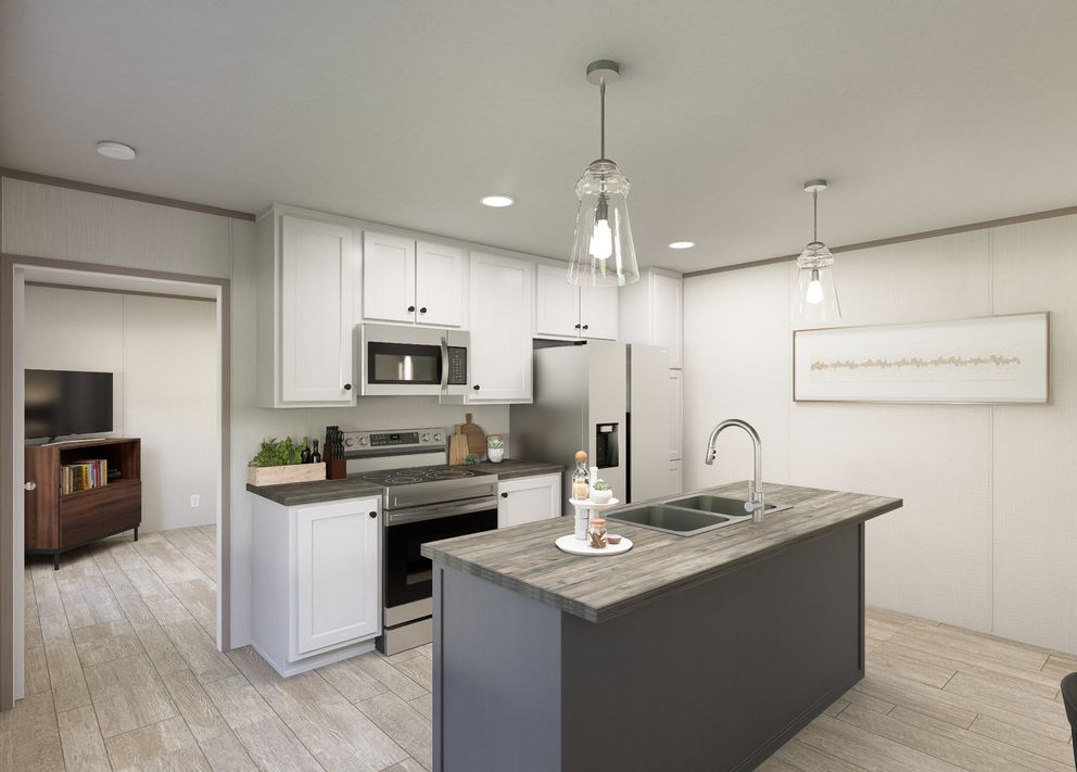 The FLEX COASTAL BREEZE Kitchen. This Manufactured Mobile Home features 3 bedrooms and 2 baths.
