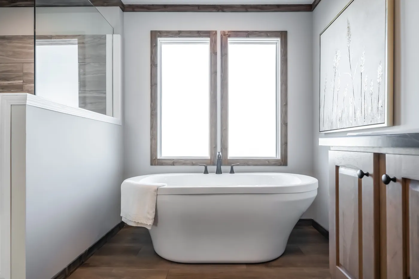 The THE JACKSON Primary Bathroom. This Manufactured Mobile Home features 4 bedrooms and 2 baths.