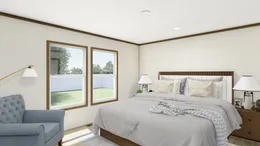 The AMBITION Primary Bedroom. This Manufactured Mobile Home features 4 bedrooms and 2 baths.