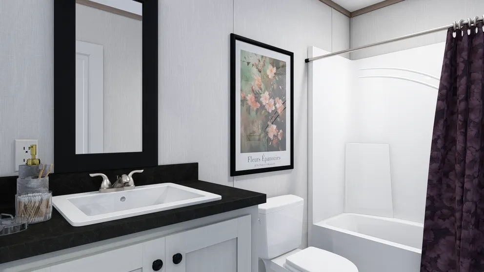 The 5228-E774P THE PULSE Guest Bathroom. This Manufactured Mobile Home features 3 bedrooms and 2 baths.