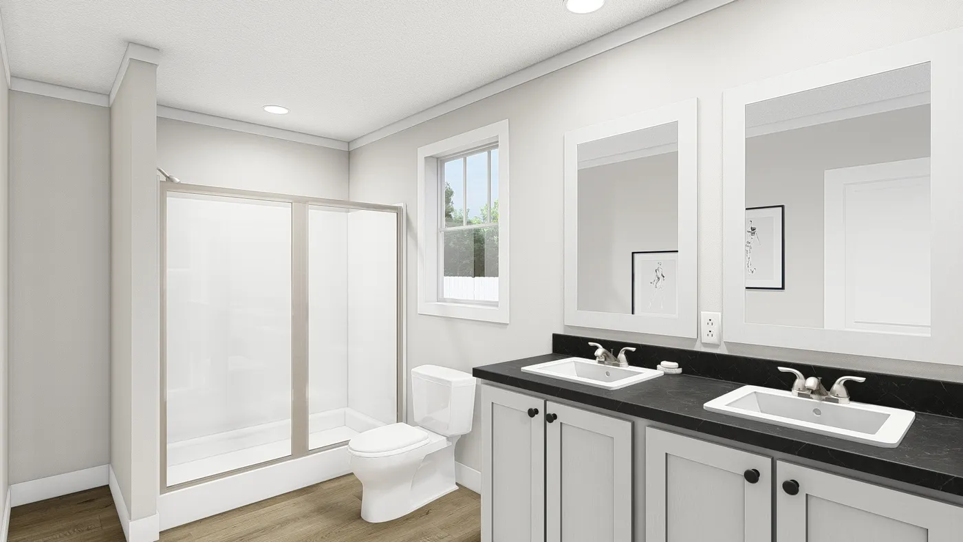 The UNDER PRESSURE Primary Bathroom. This Manufactured Mobile Home features 3 bedrooms and 2 baths.