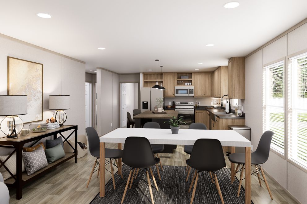 The TRADITION 3260 Dining Area. This Manufactured Mobile Home features 3 bedrooms and 2 baths.
