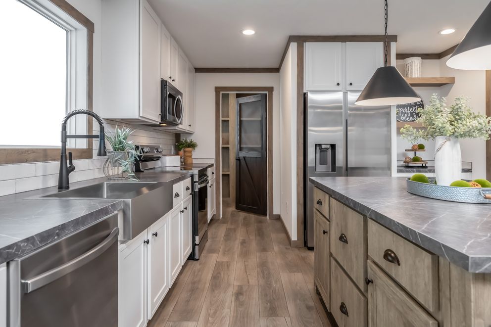 The THE LIZZIE Kitchen. This Manufactured Mobile Home features 3 bedrooms and 2 baths.