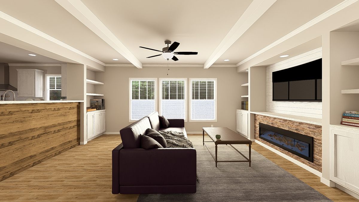 The THE HEXAGON Living Room. This Manufactured Mobile Home features 4 bedrooms and 3 baths.
