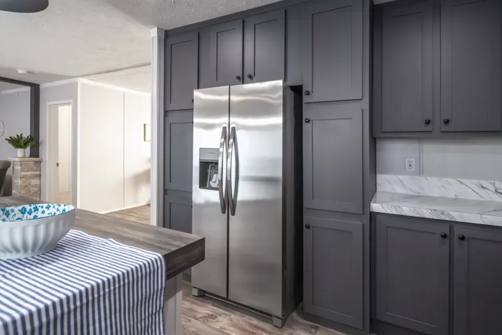 The THE FUSION 32B Kitchen. This Manufactured Mobile Home features 4 bedrooms and 2 baths.