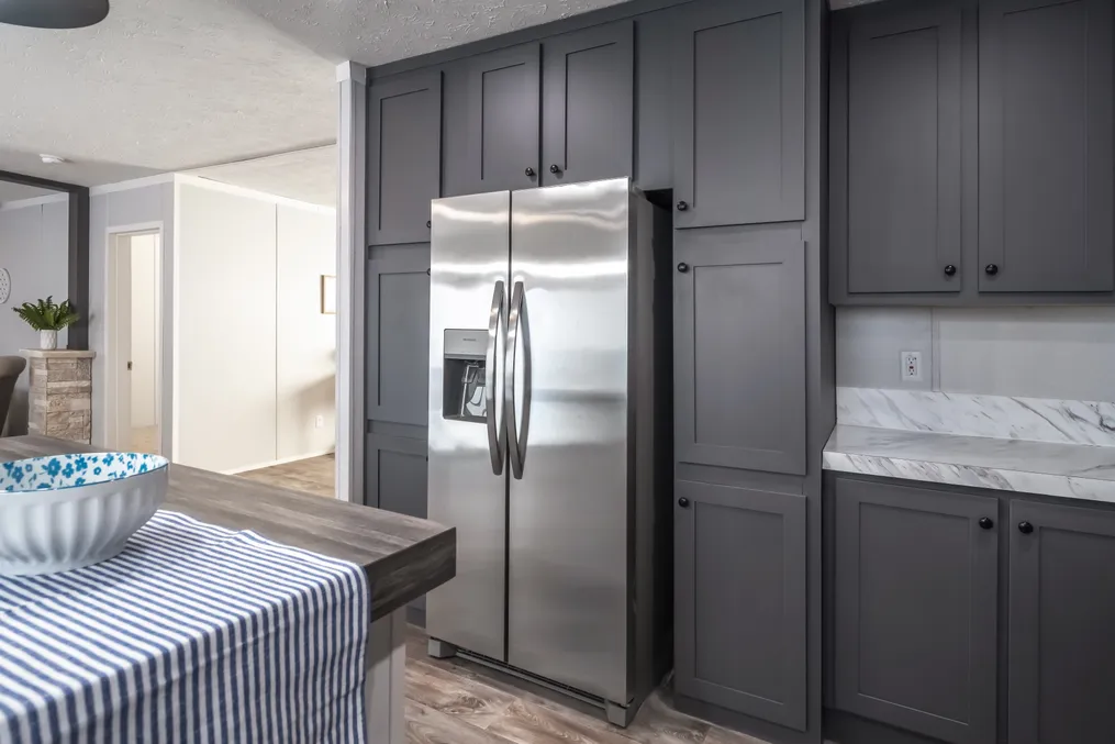 The THE FUSION 32B Kitchen. This Manufactured Mobile Home features 4 bedrooms and 2 baths.