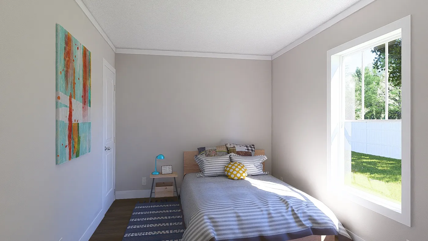 The MOVE ON UP Guest Bedroom. This Manufactured Mobile Home features 3 bedrooms and 2 baths.