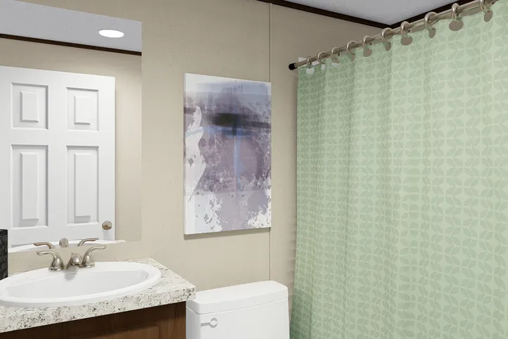 The GLORY Guest Bathroom. This Manufactured Mobile Home features 3 bedrooms and 2 baths.