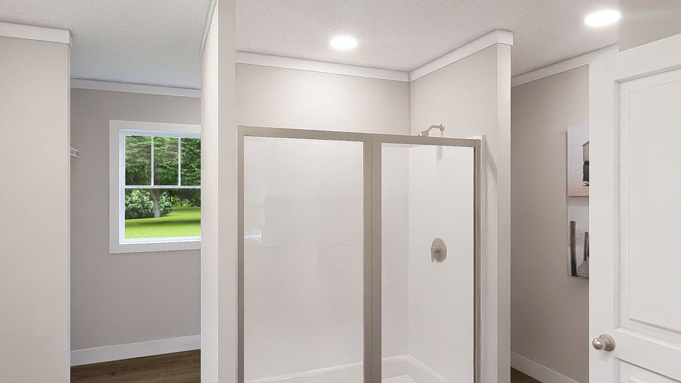 The SHOUT Primary Bathroom. This Manufactured Mobile Home features 3 bedrooms and 2 baths.